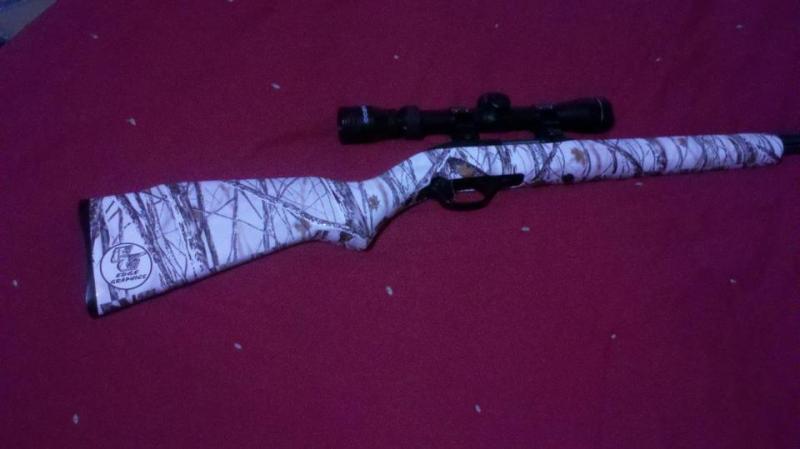 .22 stock wrapped in snow camo